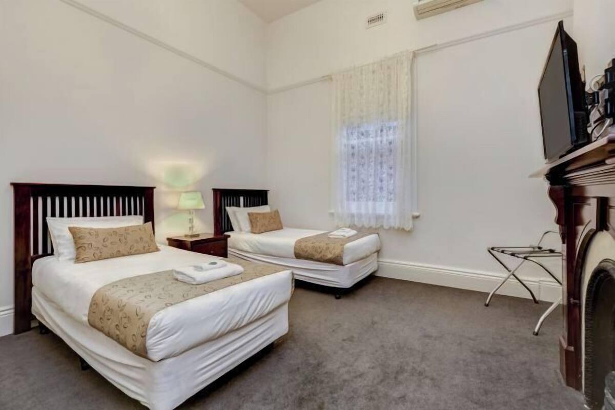 Premium bedding, minibar, blackout curtains, iron/ironing board