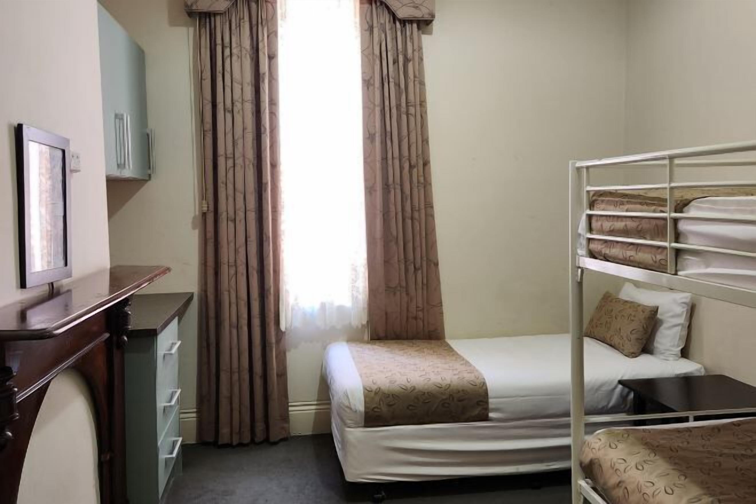 Premium bedding, minibar, blackout curtains, iron/ironing board