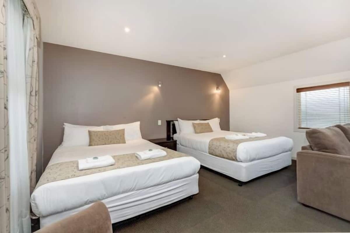 Premium bedding, minibar, blackout curtains, iron/ironing board