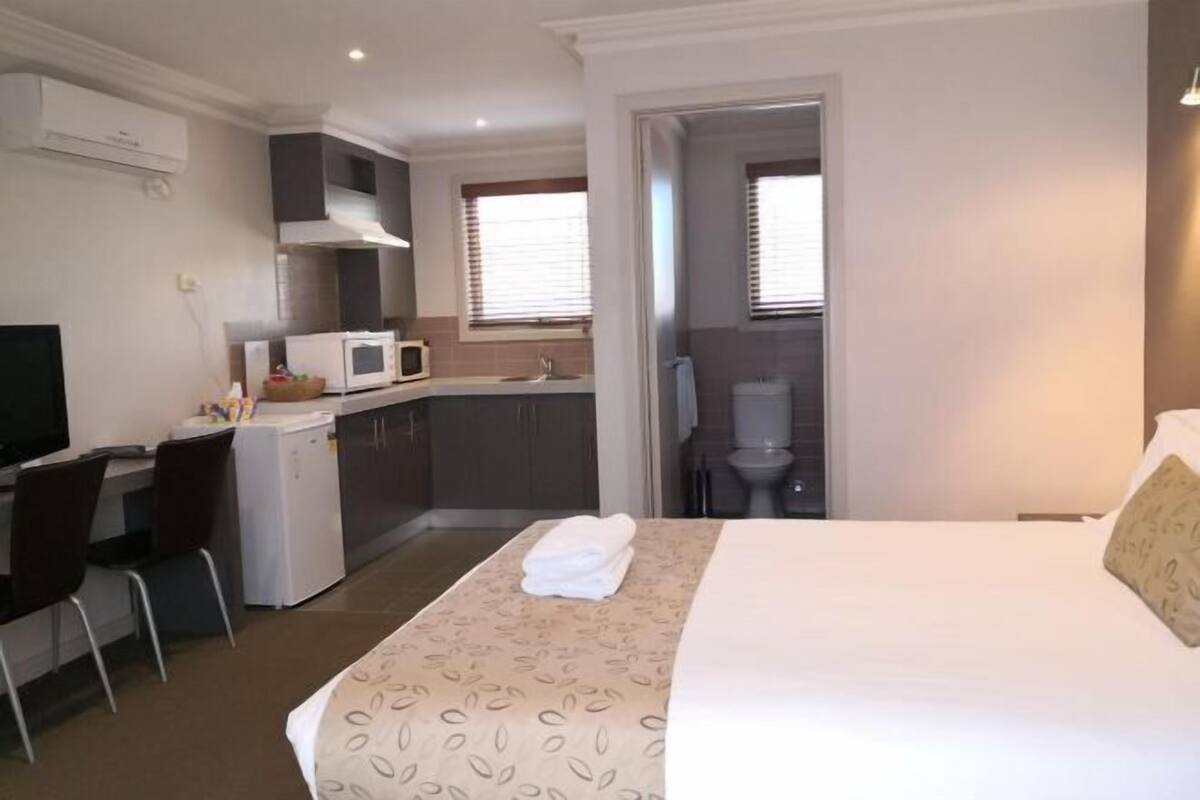 Premium bedding, minibar, blackout curtains, iron/ironing board