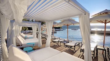 Private beach, sun loungers, beach umbrellas, beach towels