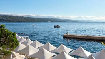 Private beach, sun loungers, beach umbrellas, beach towels