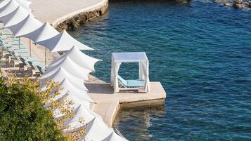 Private beach, sun loungers, beach umbrellas, beach towels