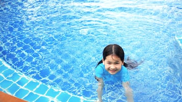 Seasonal outdoor pool, pool umbrellas, pool loungers