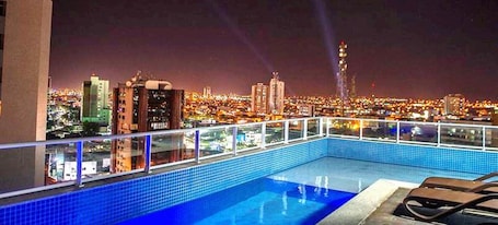 Outdoor pool, open 8:00 AM to 10:00 PM, pool umbrellas, sun loungers