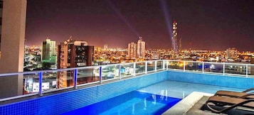 Outdoor pool, open 8:00 AM to 10:00 PM, pool umbrellas, sun loungers