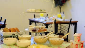 Daily buffet breakfast (USD 18.00 per person)