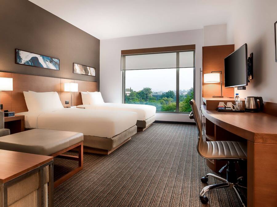 Premium bedding, memory-foam beds, in-room safe, desk