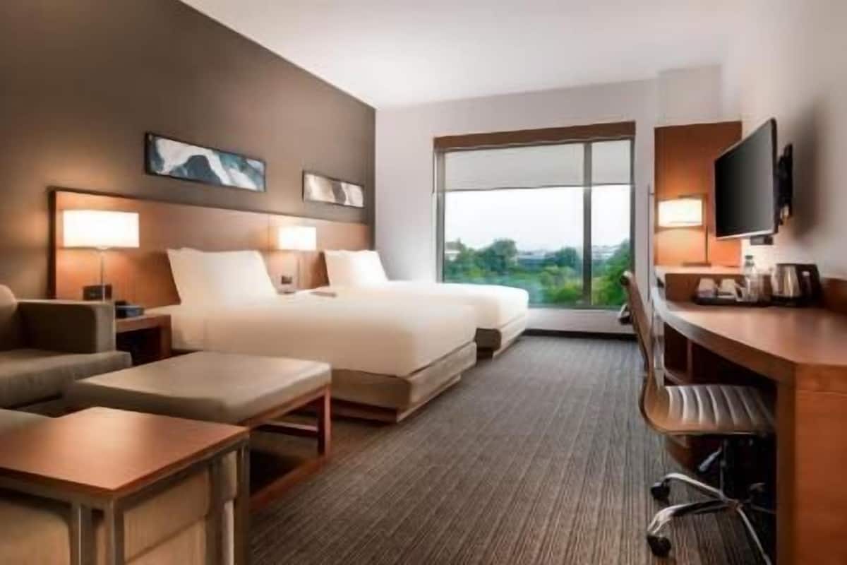 Premium bedding, memory foam beds, in-room safe, desk