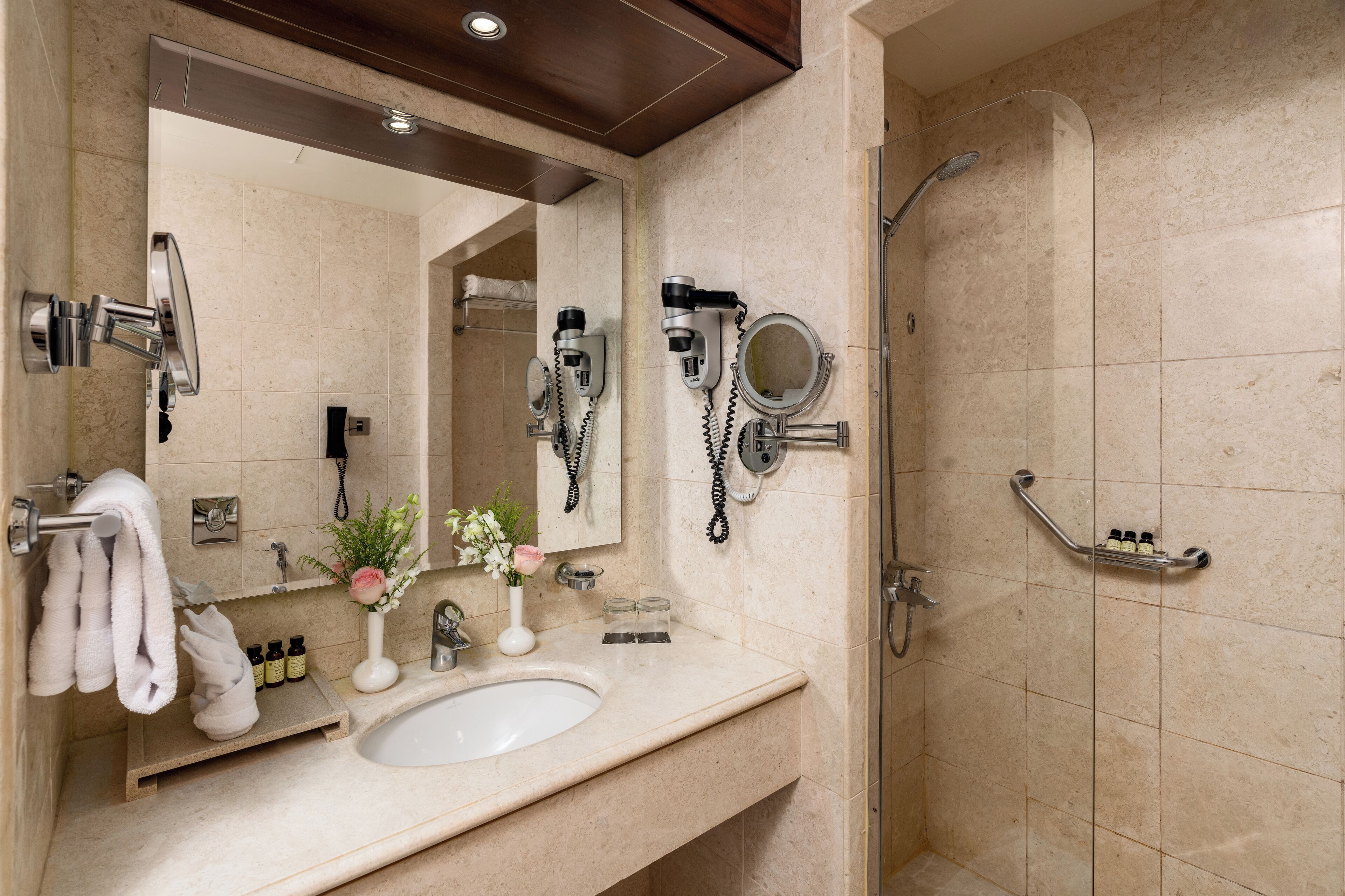 deluxe room, 1 king bed (haram view) | bathroom | rainfall showerhead, designer toiletries, hair dryer, slippers