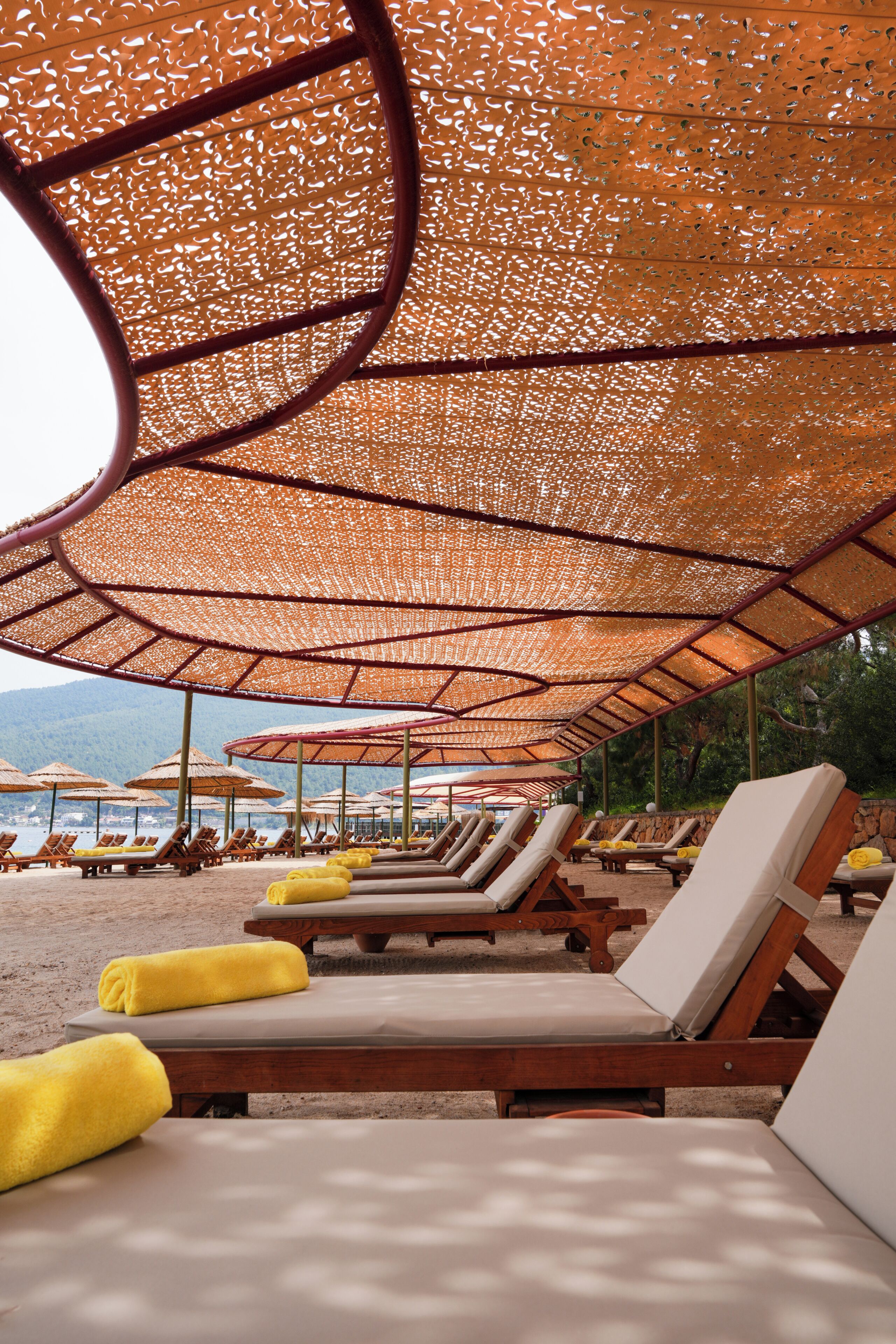 On the beach, sun loungers, beach umbrellas, beach bar