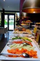 Breakfast, lunch, dinner served; local cuisine 