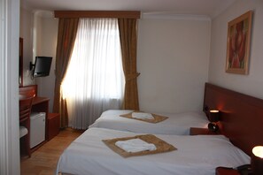 Coffres-forts dans les chambres, fer et planche à repasser