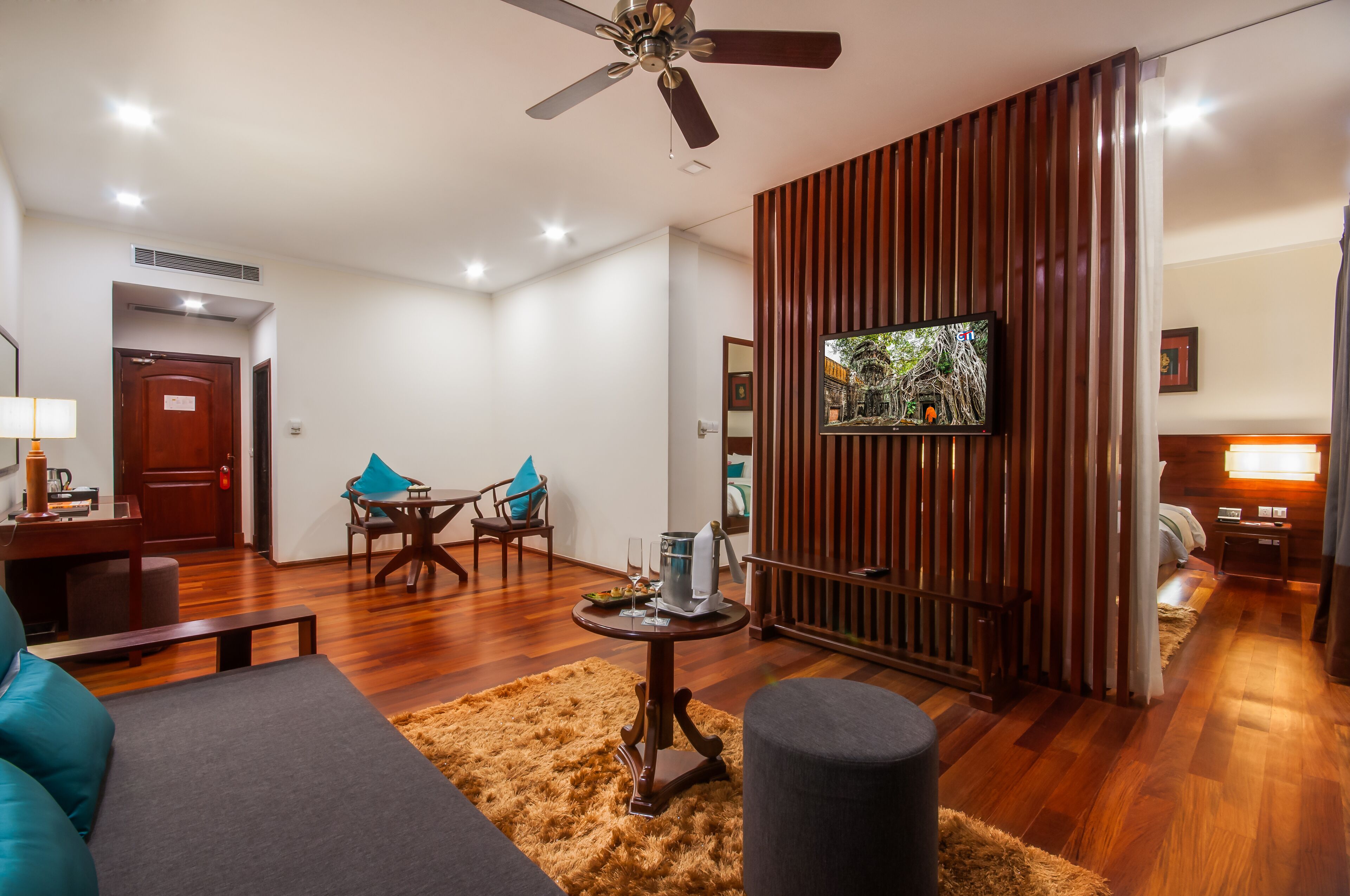 suite, balcony | living area | 42-inch lcd tv with satellite channels, tv, fireplace