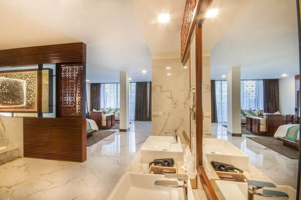 Shower, rainfall showerhead, designer toiletries, hair dryer