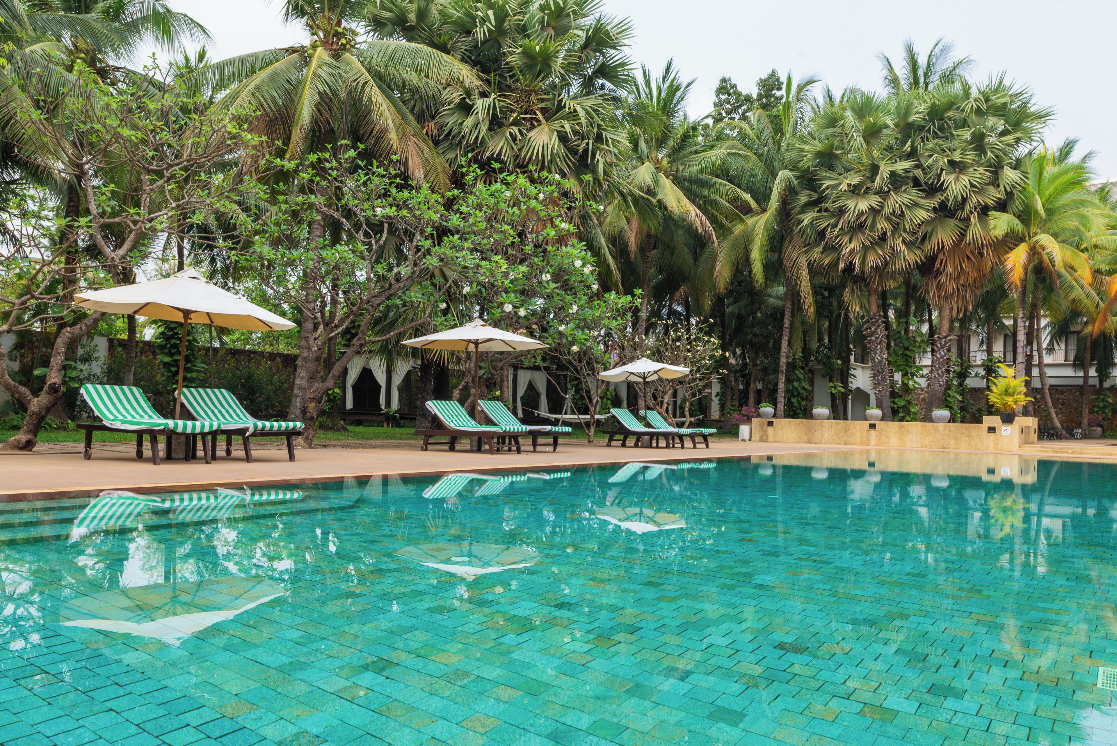 outdoor pool, pool umbrellas, pool loungers