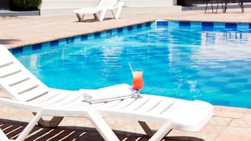 Outdoor pool, pool umbrellas, pool loungers