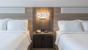 Desk, laptop workspace, blackout curtains, cots/infant beds