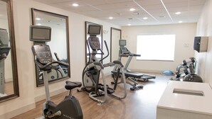 A fitness center with treadmills, elliptical machines, and a weight bench. - Holiday Inn Express & Suites Temple - Medical Center Area by IHG (Temple)