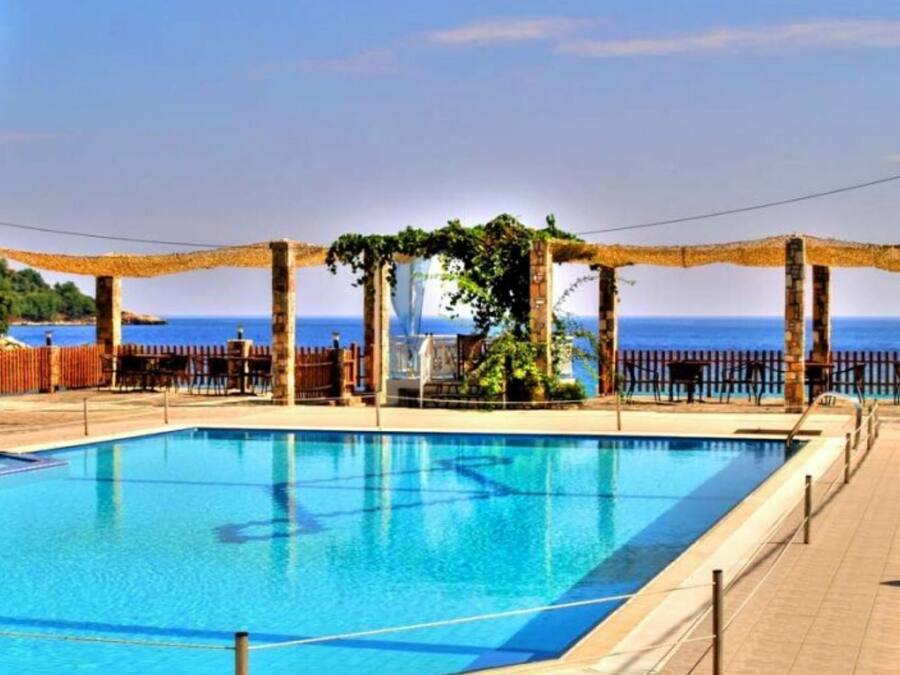 Seasonal outdoor pool, pool umbrellas, sun loungers
