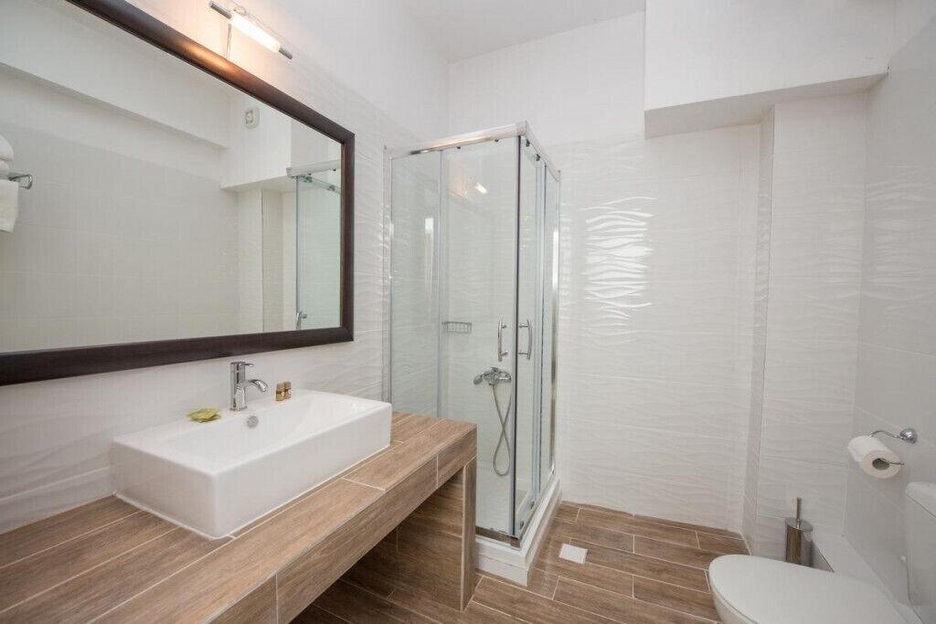 economy room, garden view | bathroom | shower, free toiletries, hair dryer, towels