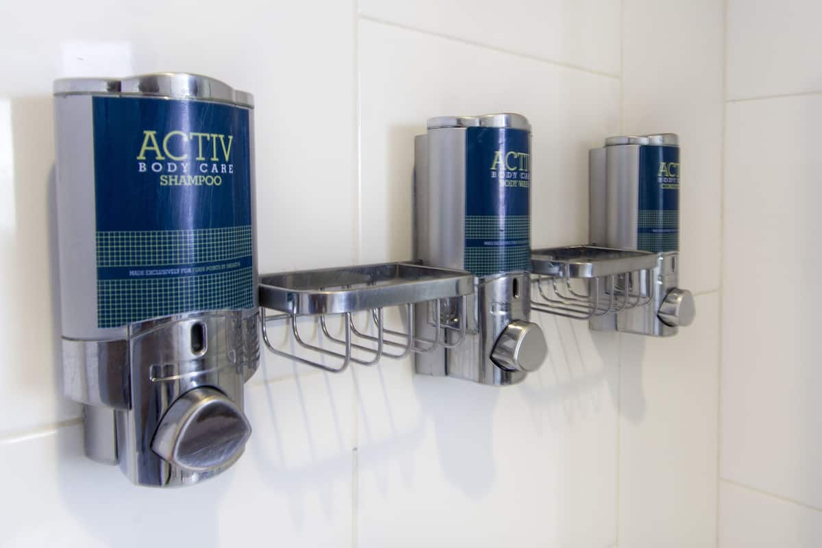 classic room | bathroom amenities | hair dryer, towels, soap, shampoo