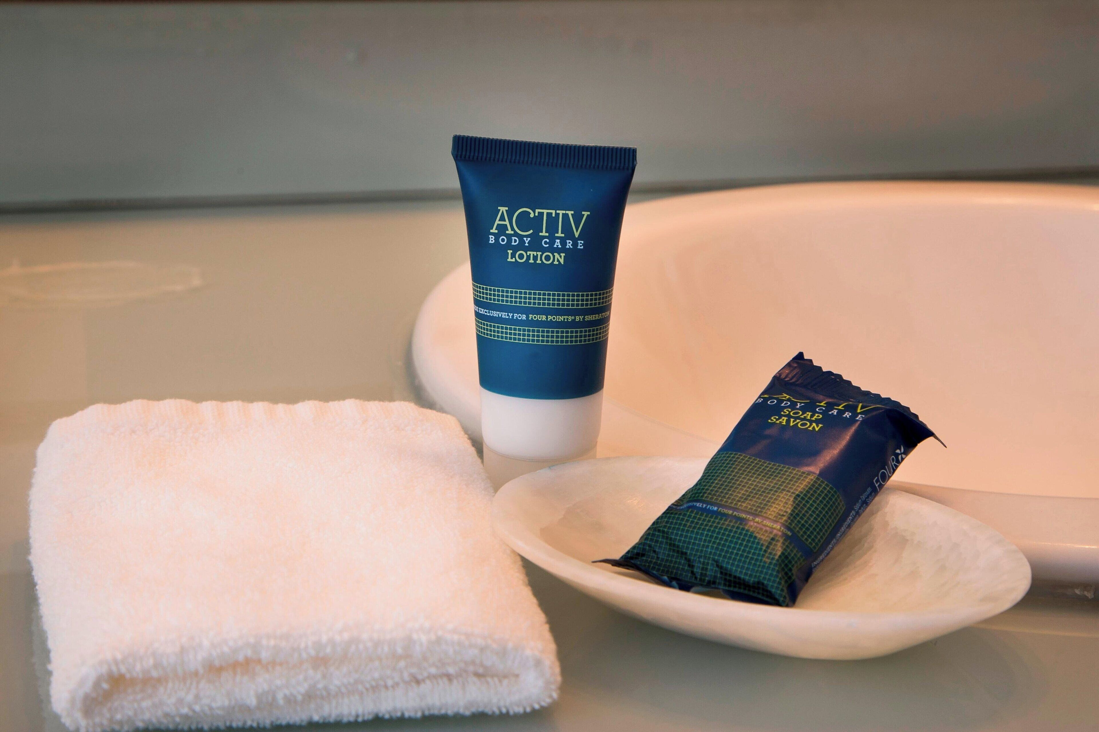 hair dryer, towels, soap, shampoo