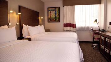 Ropa de cama de alta calidad y minibar