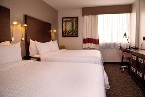 Ropa de cama de alta calidad y minibar