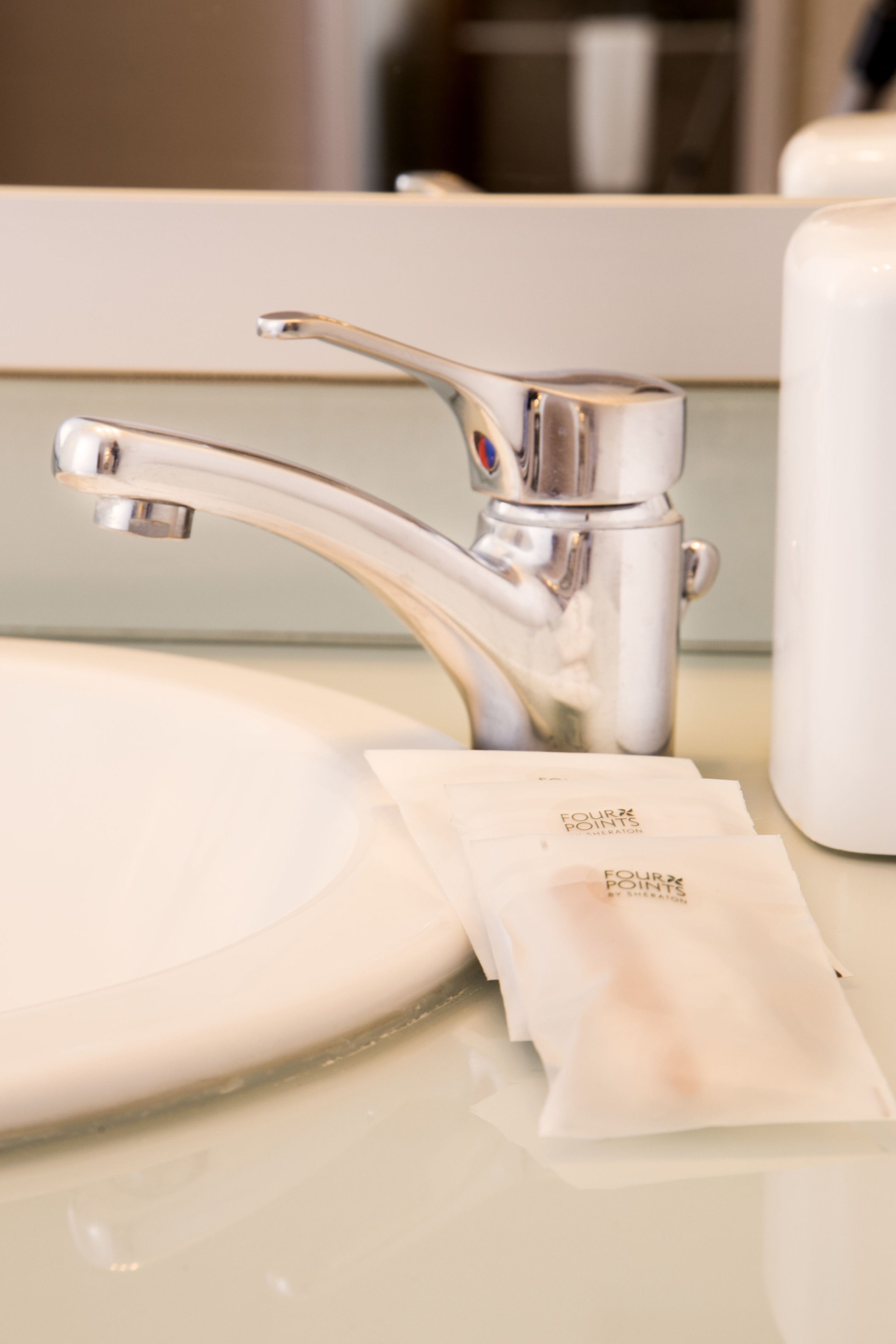 classic room | bathroom amenities | hair dryer, towels, soap, shampoo