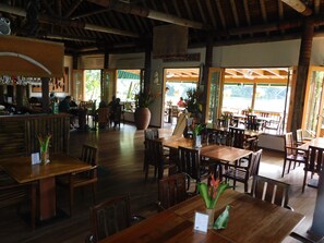 Breakfast, lunch, dinner served; local cuisine, garden views