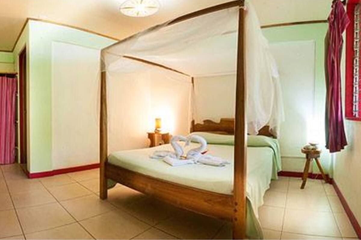 Standard Double Room, 1 Queen Bed, Patio, Garden View | In-room safe, desk, free cots/infant beds, rollaway beds