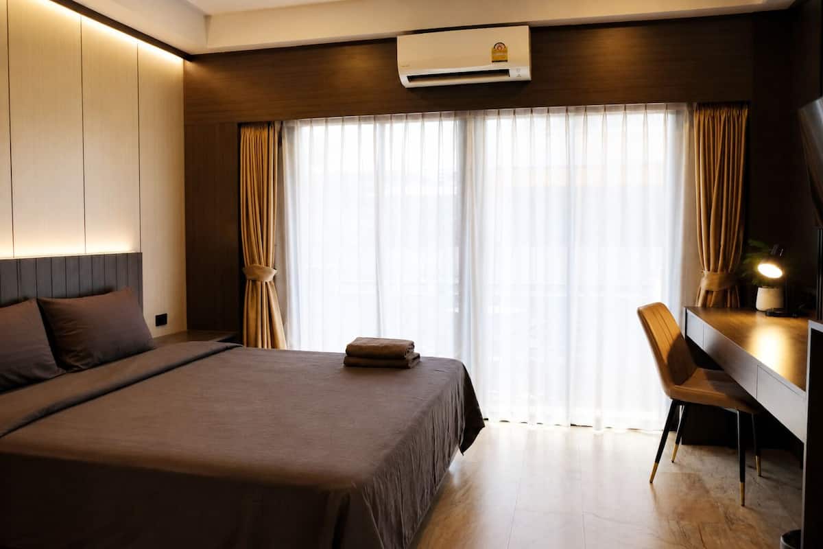In-room safe, desk, laptop workspace, blackout curtains