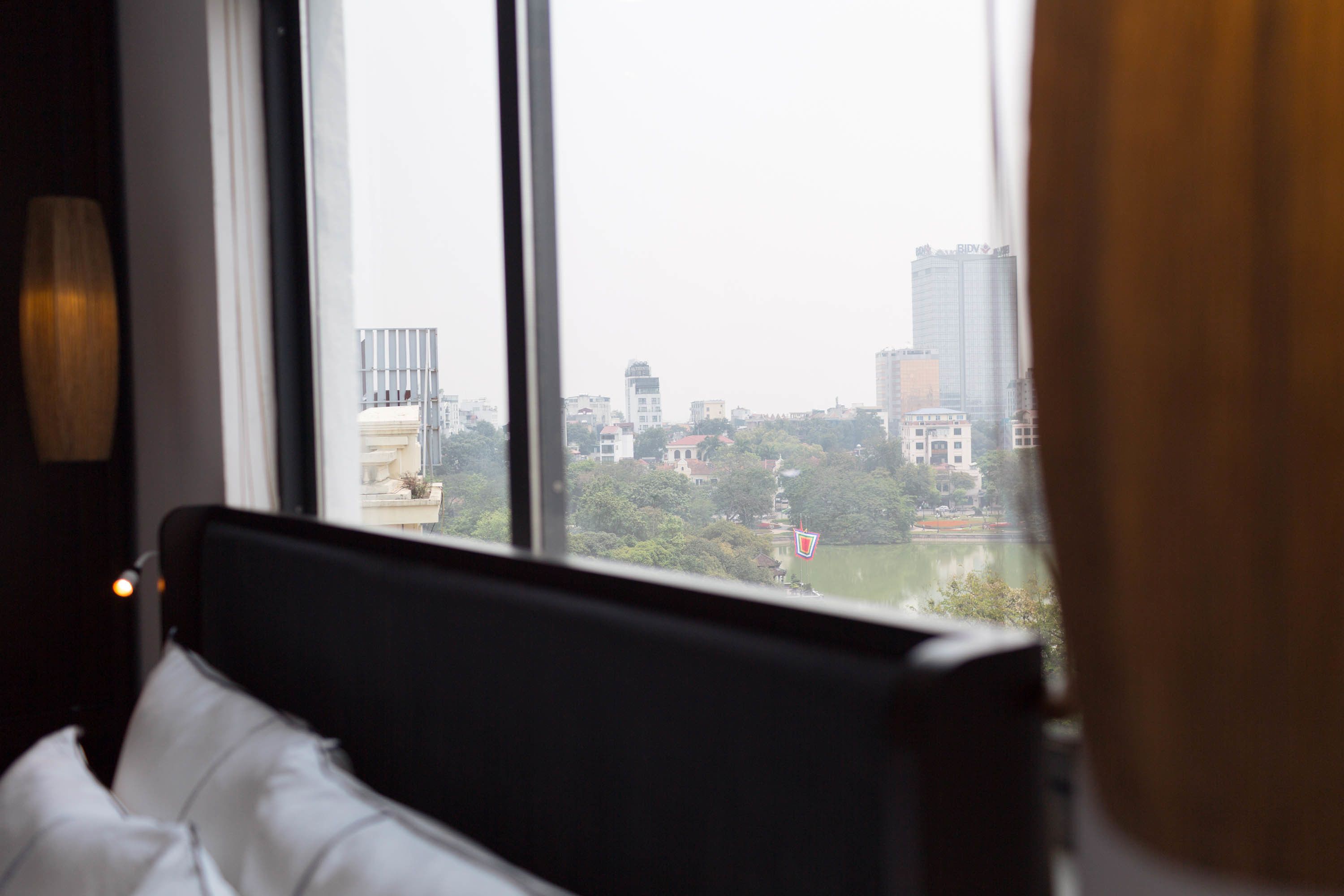 premier room, 1 king bed, non smoking, city view | premium bedding, pillow-top beds, minibar, in-room safe