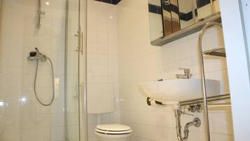 Basic Apartment, 1 Bedroom | Bathroom | Shower, hair dryer, towels