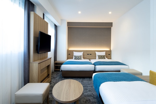 Deluxe Triple Room, Non Smoking (Cleaning is Optional with Additional Cost) | Desk, blackout drapes, iron/ironing board, free WiFi