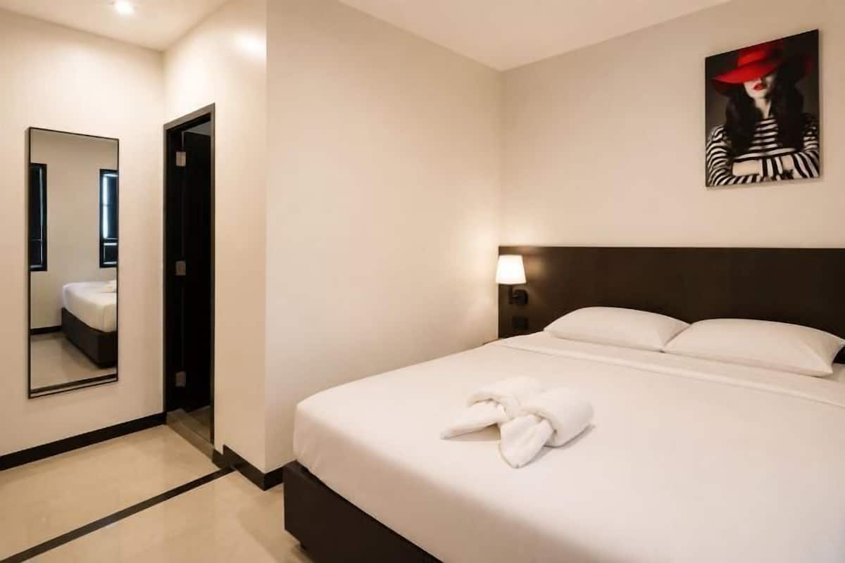 Cofres nos quartos, Wi-Fi de cortesia, roupa de cama