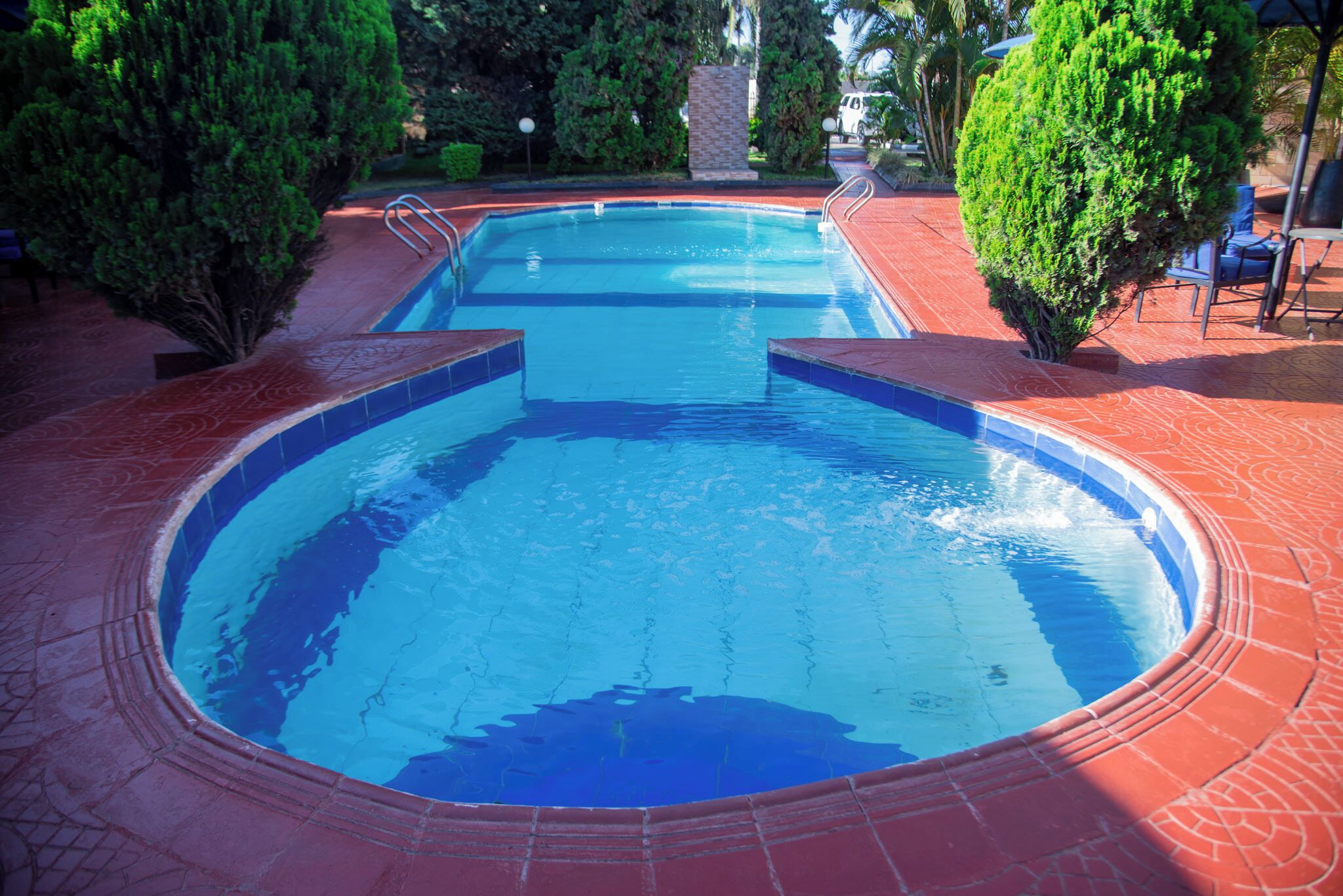 Outdoor pool, pool umbrellas, sun loungers