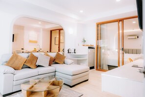 Luxury Quadruple Room | Living area | 32-inch LCD TV with cable channels, TV, DVD player - Chaolao Cabana Resort (Tha Mai)