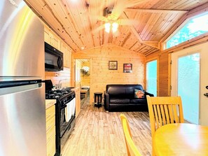 32-inch flat-screen TV with satellite channels, TV