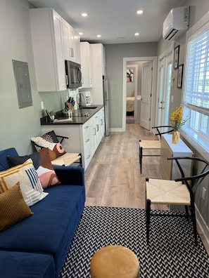 House, 1 Bedroom (No pets, tiny house, linens included) | Living area - Yukon Trails RV & Camping Resort (Lyndon Station)