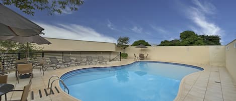 Outdoor pool, open 7 AM to 8:00 PM, pool umbrellas, pool loungers