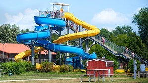 A water park with multiple slides and a viewing platform. - O'Connell's RV Campground (Amboy)