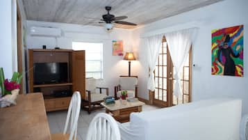 Cottage, 3 Bedrooms, Garden View (Inagua) | Living area | 46-inch flat-screen TV with cable channels, TV, DVD player