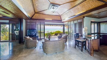 Ultimate Beachfront Villa (2 Bedroom) | Living room | LCD TV