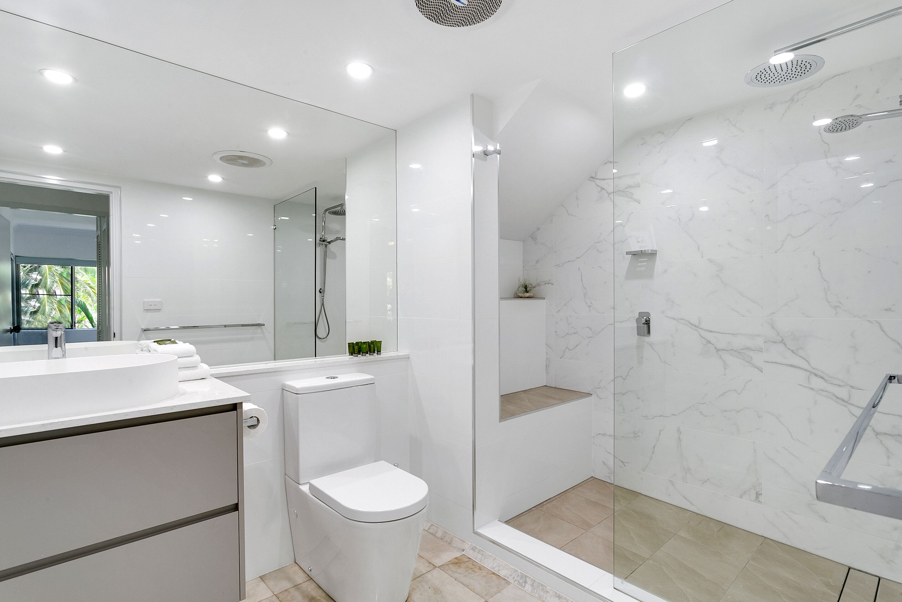 deluxe two bedroom two bathroom apartment | bathroom | free toiletries, hair dryer, towels