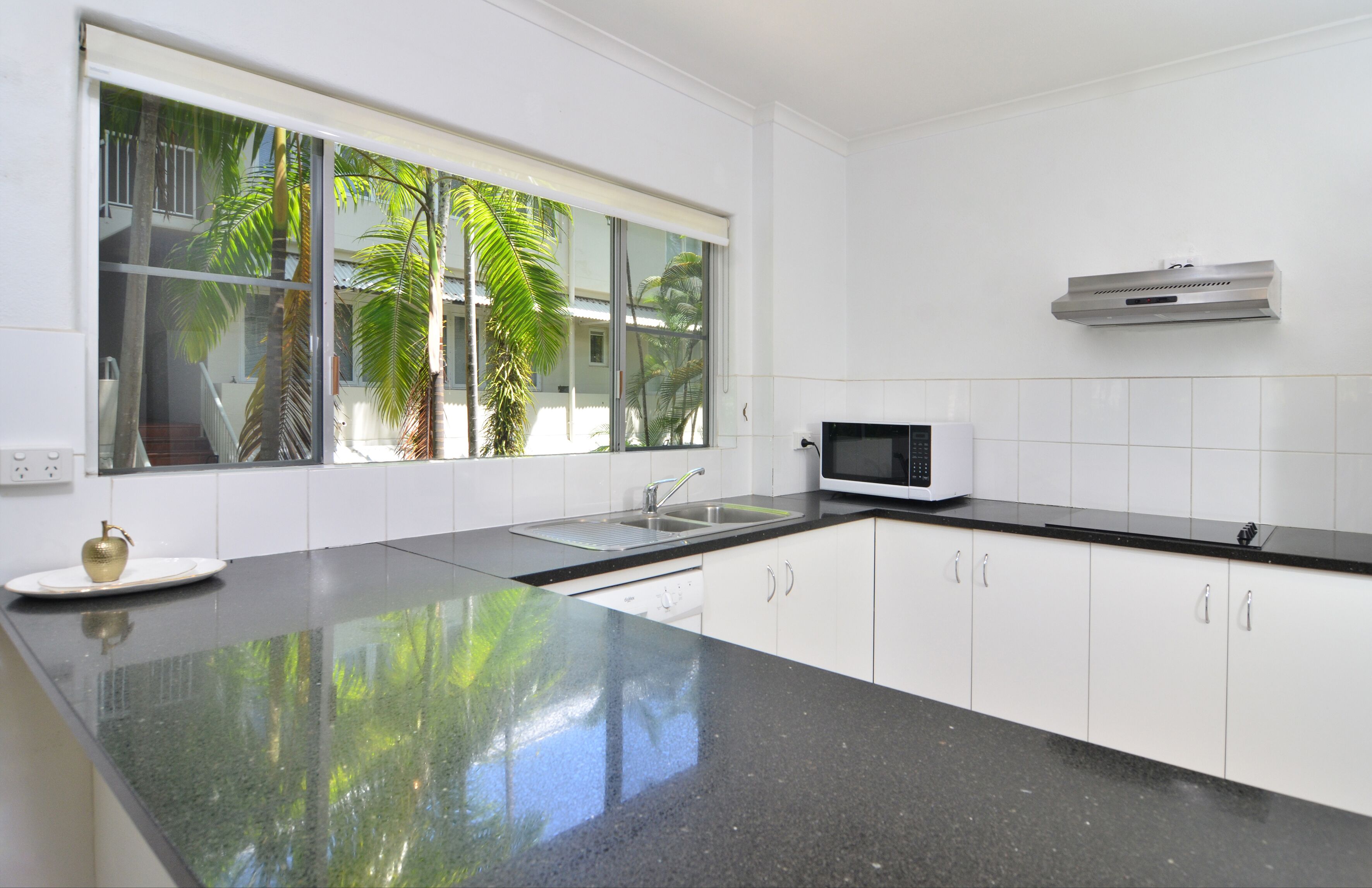 three bedroom apartment | private kitchen | fridge, microwave, oven, stovetop