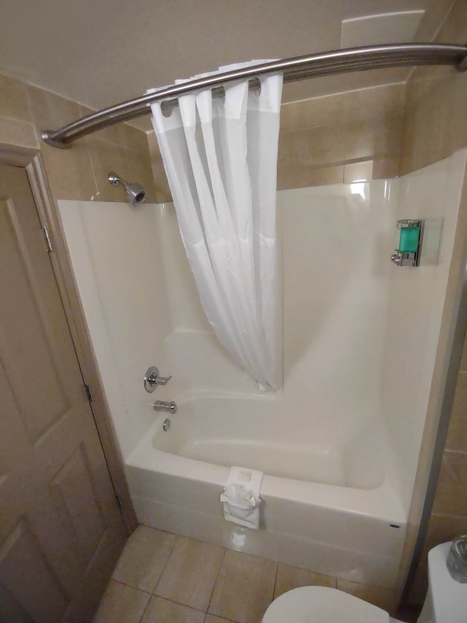 combined shower/bathtub, free toiletries, hair dryer, towels