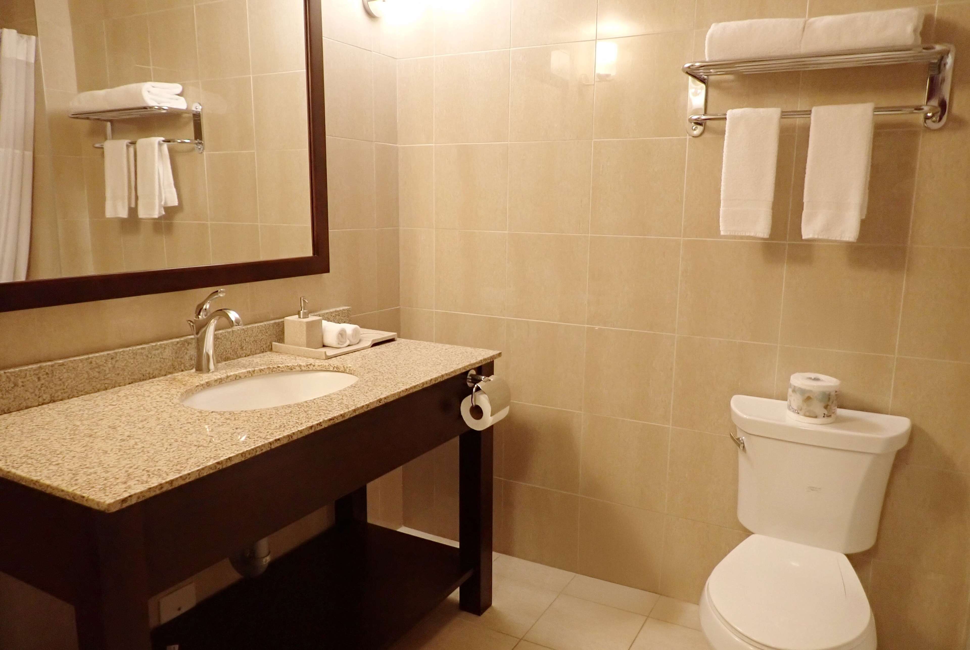 studio suite, 1 king bed, non smoking, kitchenette | bathroom | combined shower/bathtub, free toiletries, hair dryer, towels