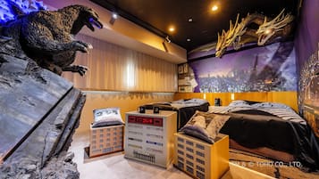 Godzilla vs. King Ghidorah Room | Premium bedding, in-room safe, blackout curtains, iron/ironing board
